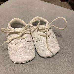 White baby shoes christening baptism like new